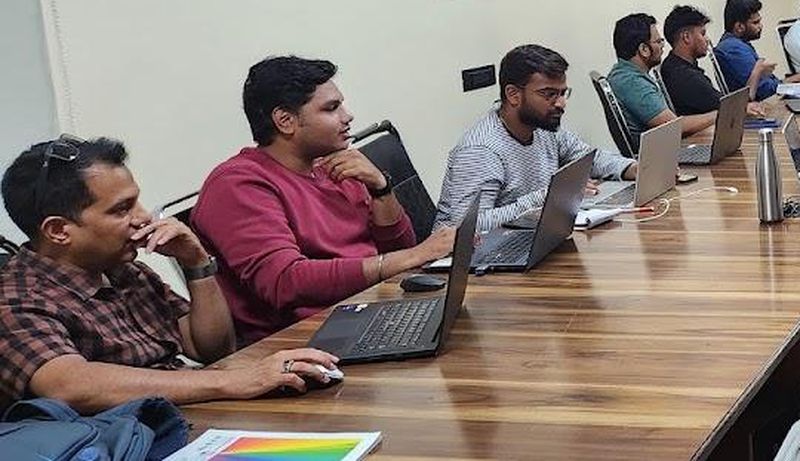 Students working on laptops in the Ameerpet training room